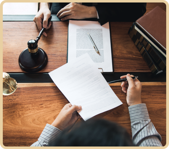 Lawyer and client reviewing legal documents